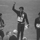 United States runners Larry James, left, Lee Evans, center, and Ron Freeman are shown after receiving their medals for the 400-meter race at the Mexico City Games in Mexico City, in this Oct. 18, 1968, file photo.
